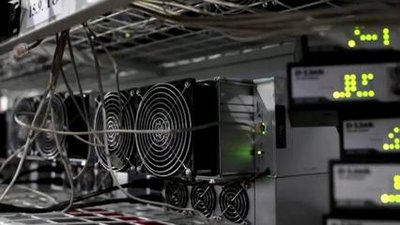 A mining farm in Canada with rows of ASIC miners, highlighting the infrastructure and cooling systems